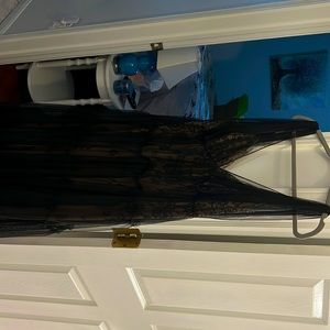 New with tags. Stunning lace overlay gown for prom princess. Size 12